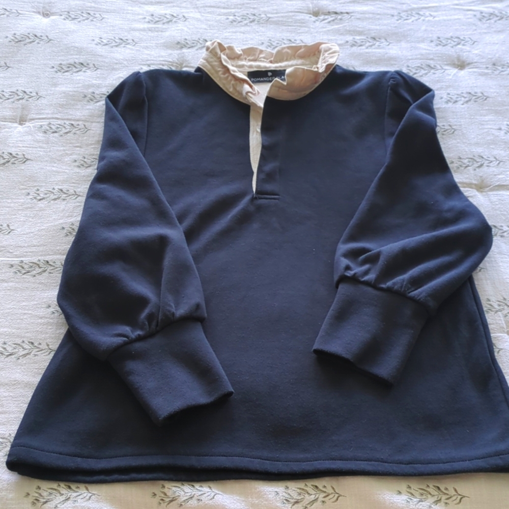 EUC Tuckernuck ruffle neck top